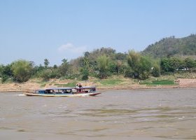 Long Traditional Boat on the Mekong River, in Luang Prabang
