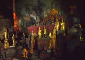 Statues covered by golden leaves